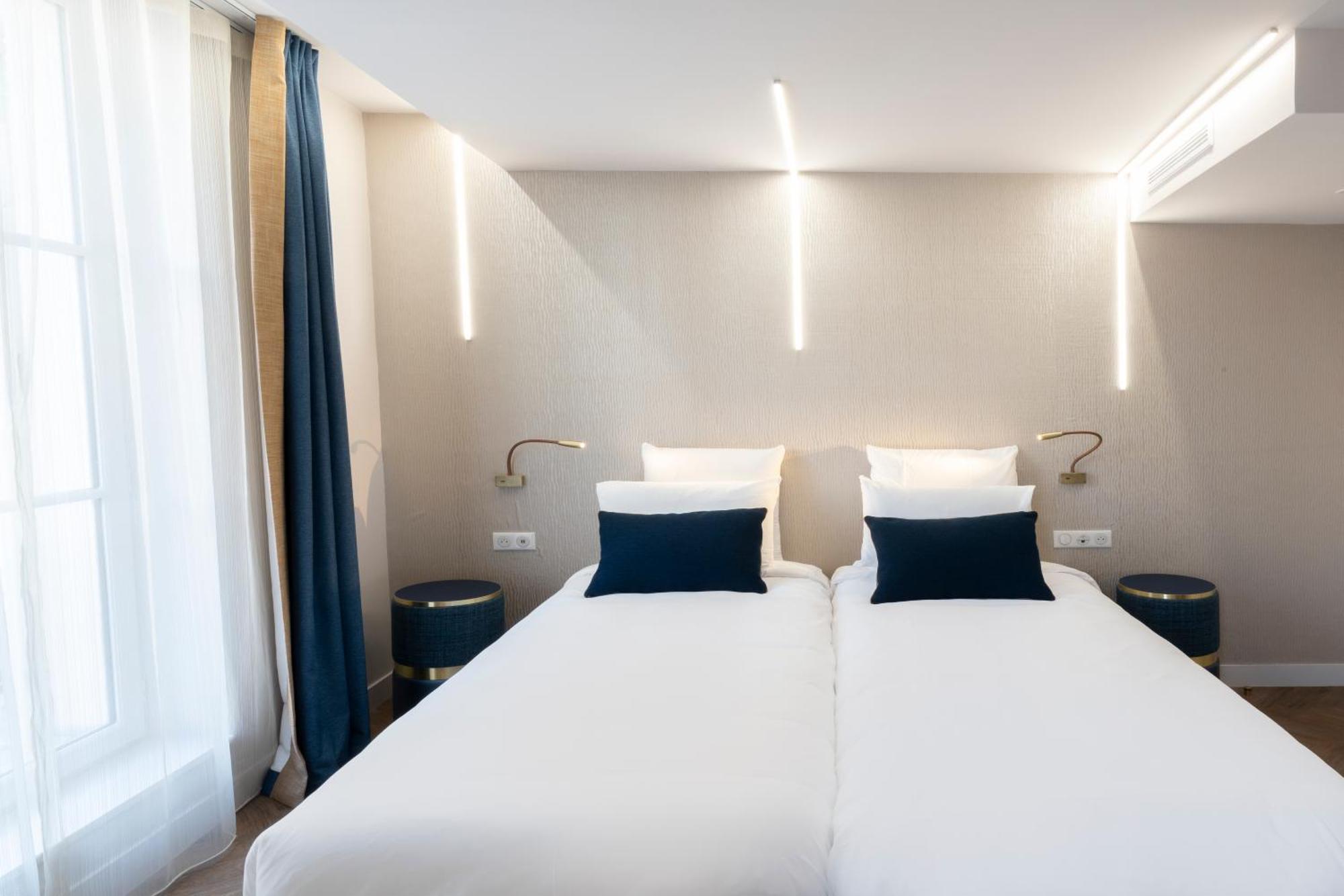 Hôtel Mercure Paris Opéra Lafayette Quarto foto